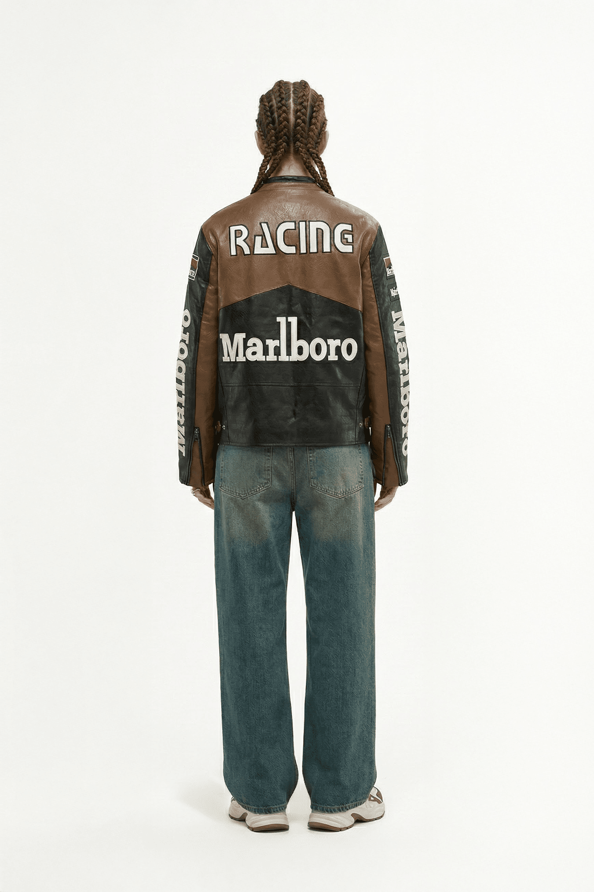Brown and black racing leather jacket with Marlboro logo, worn by model from revnhaus