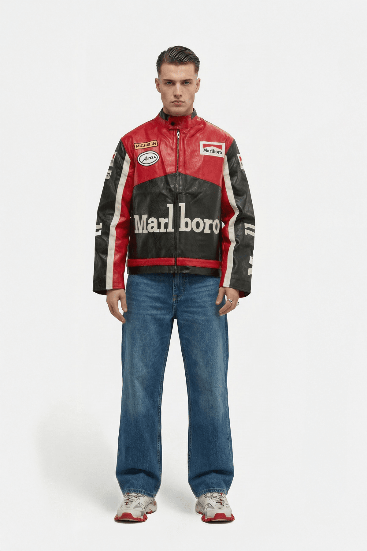 Red and black racing jacket with Marlboro, Michelin, and Aral logos, styled with jeans and sneakers from revnhaus