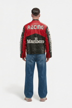 Red and black Marlboro racing leather jacket with bold back print, worn with jeans from revnhaus
