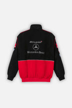 Black and red McLaren Mercedes-Benz racing jacket with team logos, from revnhaus