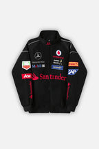 Black racing jacket with sponsor logos including Santander, Vodafone, Mercedes-Benz from revnhaus