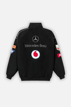Black Mercedes-Benz racing jacket with Vodafone logo and sponsor patches from revnhaus