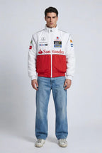 White and red racing jacket with sponsor logos, paired with blue jeans, from revnhaus