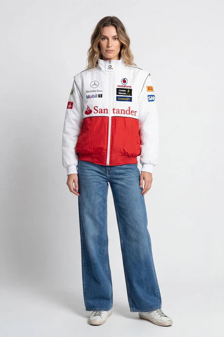 White and red racing jacket with sponsor logos, paired with wide-leg jeans from revnhaus