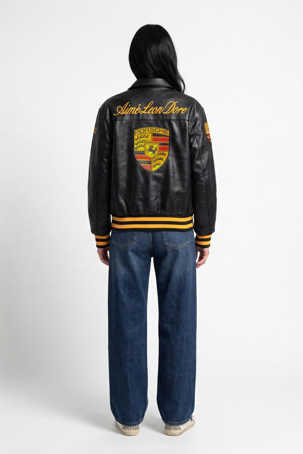 Black Porsche varsity jacket with embroidered crest and Aime Leon Dore logo from revnhaus