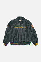 Black Porsche racing leather jacket with gold lettering and stripes from revnhaus