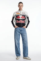 Red Bull racing jacket with Motul and Michelin logos, styled with jeans from revnhaus