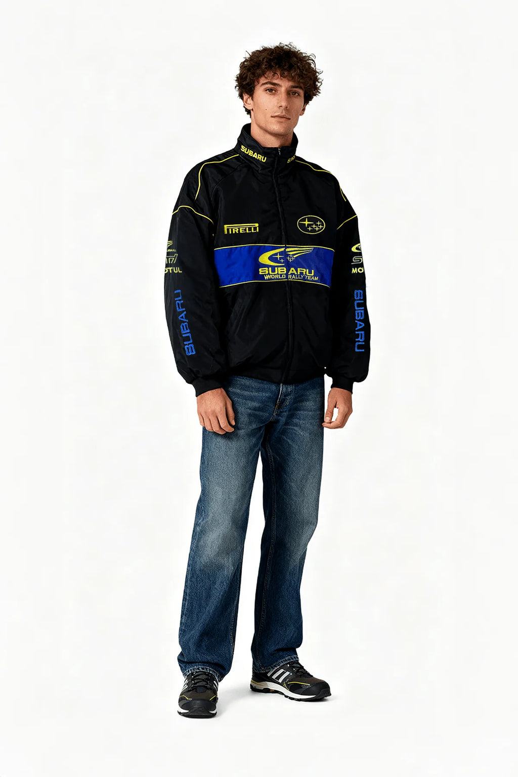 Subaru World Rally Team racing jacket with Pirelli logos, black with blue and yellow accents, from revnhaus