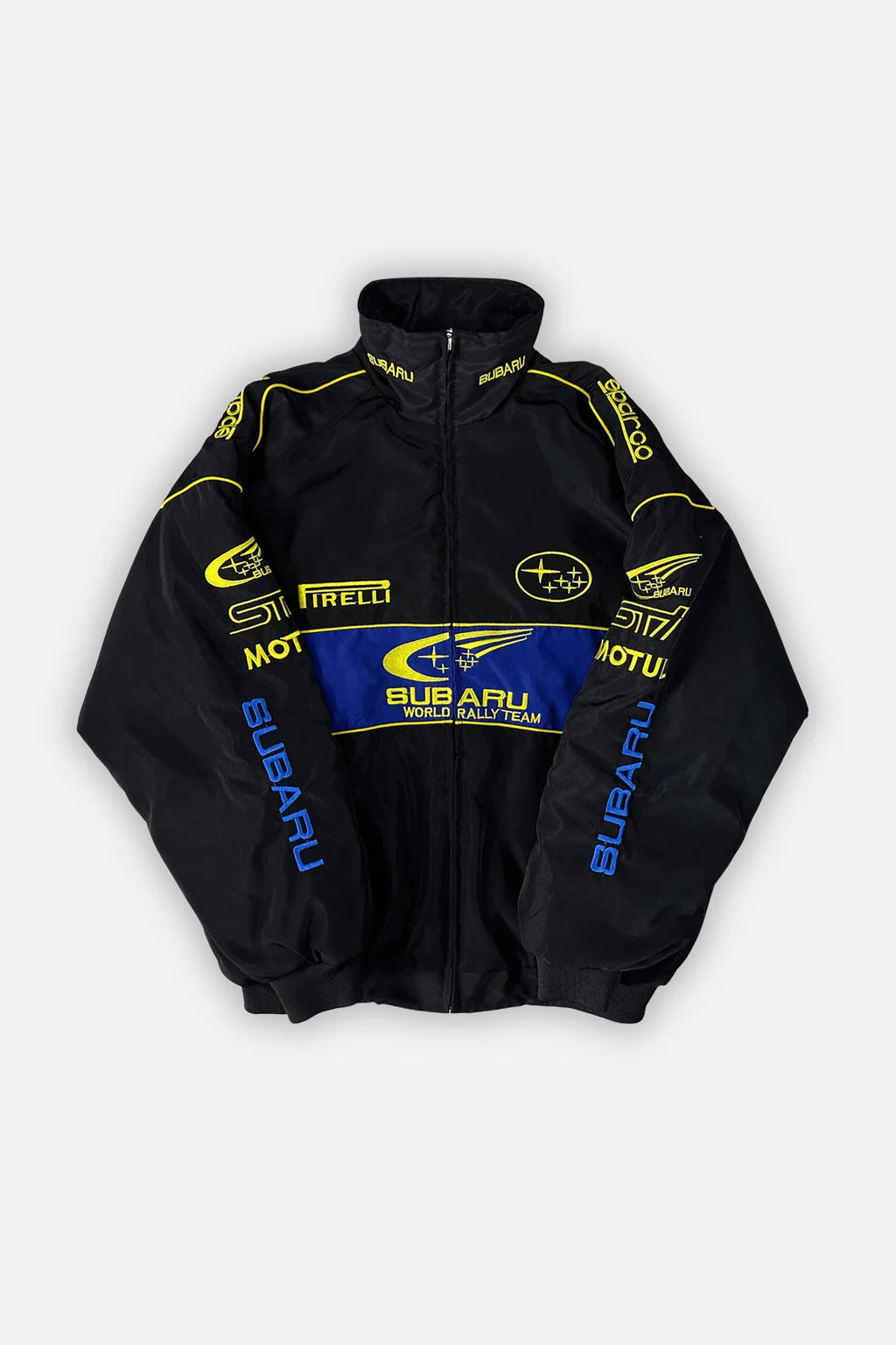 Black Subaru World Rally Team jacket with yellow and blue sponsor logos, from revnhaus