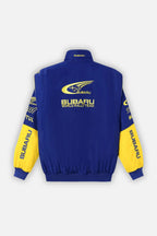 Blue and yellow Subaru World Rally Team racing jacket with logo details from revnhaus