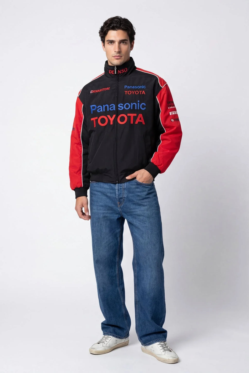 Panasonic Toyota racing jacket with red sleeves and sponsor logos, styled with jeans from revnhaus