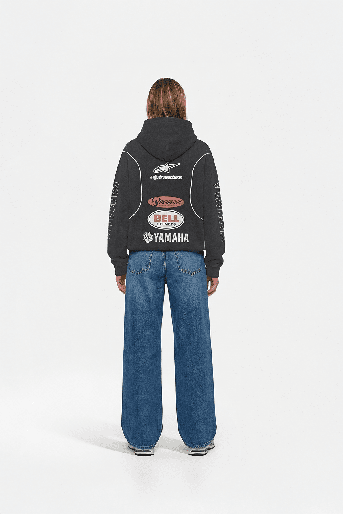 Black motorsport hoodie with Alpinestars, Akrapovic, Bell Helmets, Yamaha logos from revnhaus