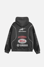 Black motorsport hoodie with Alpinestars, Akrapovic, Bell Helmets, Yamaha logos from revnhaus